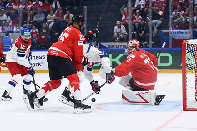 From left Darnell Nurse of Canada, Lukas Sedlak of Czech Republic and goalkeeper Jet Greaves of Canada in action during the IIHF World Championship, WM, Weltmeisterschaft Group B match Czech Republic vs Canada on May 26, 2026, Fribourg, Switzerland. (CTKxPhoto RadekxPetrasek) CTKPhotoP2026052608892  CTKPhotoP2026052608892