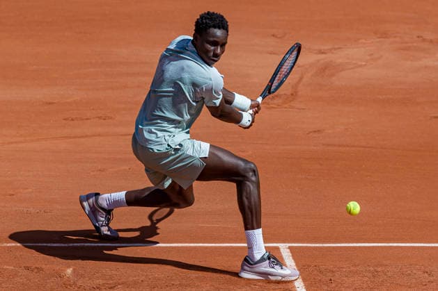 2026 French Open - Day Three Moise Kouame returns the ball against Marin Cilic during the Roland Garros Grand Slam Tournament on Day 03 in Paris, France, on May 26, 2026. Paris France  Copyright: xRobertxSzaniszlox originalFilename:szaniszlo-notitle260526_npYvC.jpg