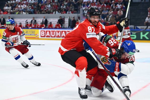 Sidney Crosby of Canada, left, and Jiri Tichacek of Czech Republic in action during the IIHF World Championship, WM, Weltmeisterschaft Group B match Czech Republic vs Canada on May 26, 2026, Fribourg, Switzerland. (CTKxPhoto RadekxPetrasek) CTKPhotoP2026052609106  CTKPhotoP2026052609106