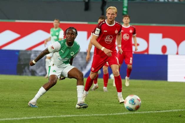 Noel Futkeu 9 Spvgg Greuther Fuerth and Ben Huening 15 Rot Weiss Essen in action, SpVgg Greuther Fuerth vs Rot Weiss Essen, Football, Men, Relegation, 2 Bundesliga, DFL, Season 2025 2026, Second leg, 26 05 2026 DFB regulations prohibit any use of photographs as image sequences and or quasi video Fuerth Bayern Germany Copyright: xkolbert-press MartinxAgüerax