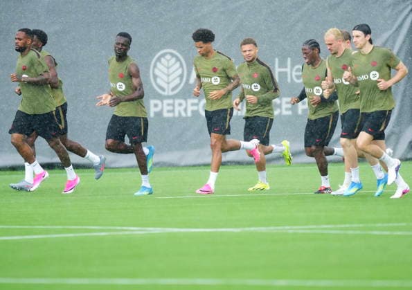 May 26, 2026, Charlotte, Nc, UNITED STATES: Team Canada players run in the pouring rain during World Cup roster selection camp in Charlotte, N.C., on Tuesday, May 26, 2026. Canada News - May 26, 2026  - ZUMAc35_ 20260526_zaf_c35_081 Copyright: xNathanxDenettex