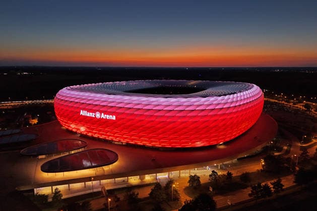 ALLIANZ ARENA lights up at night evening twilight, home ground of FC Bayern Munich, soccer stadium,stadium,overview,long shot