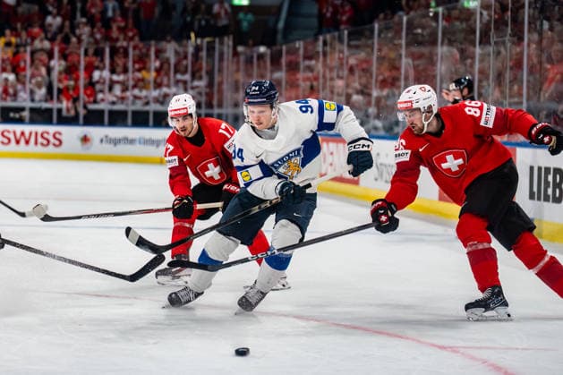 xxkeikkaxx 20260526 Swiss Life Arena, Zurich, Switzerland. IIHF Ice hockey, Eishockey World Championships match Switzerland vs Finland Konsta Helenius (94) of Team Finland Ken Jäger (17) of Team Switzerland Janis Moser (86) of Team Switzerland Photo by Pasi Suokko All Over Press  1.06232475