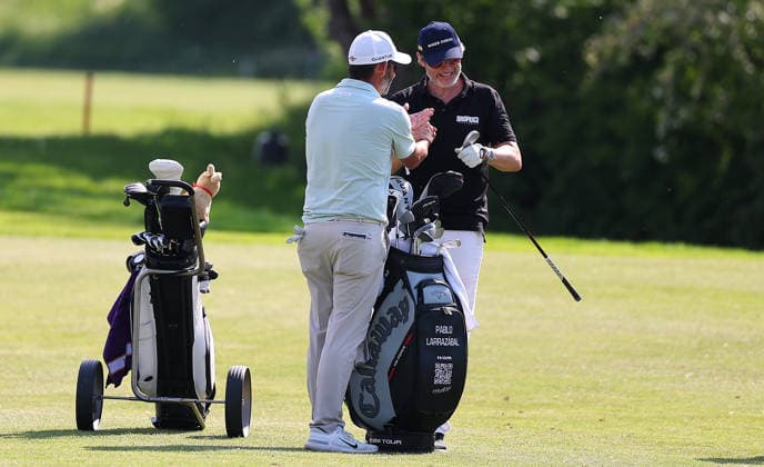 GOLF - Austrian Alpine Open KITZBUEHEL,AUSTRIA,27.MAY.26 - GOLF - DP World Tour, Austrian Alpine Open, GC Kitzbuehel-Schwarzsee-Reith, ProAm. Image shows Pablo Larabazal (ESP) and participant.  GEPAxpictures xAmirxBeganovic