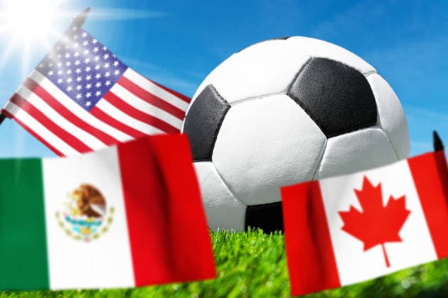 Germany - May 27, 2026: PHOTO MONTAGE, symbolic image for the 2026 FIFA World Cup, WM, Weltmeisterschaft, Fussball A soccer ball on a field of grass in front of the national flags of the United States, Mexico, and Canada. The image symbolizes the 2026 World Cup in North America, as well as international soccer tournaments, host countries, and major sporting events. *** FOTOMONTAGE, Symbolfoto zur Fußball-Weltmeisterschaft 2026: Fußball auf Spielfeldrasen vor den Nationalflaggen der USA, Mexikos und Kanadas. Das Motiv steht symbolisch für die WM 2026 in Nordamerika sowie internationale Fußballturniere, Gastgeberländer und Sportgroßveranstaltungen.