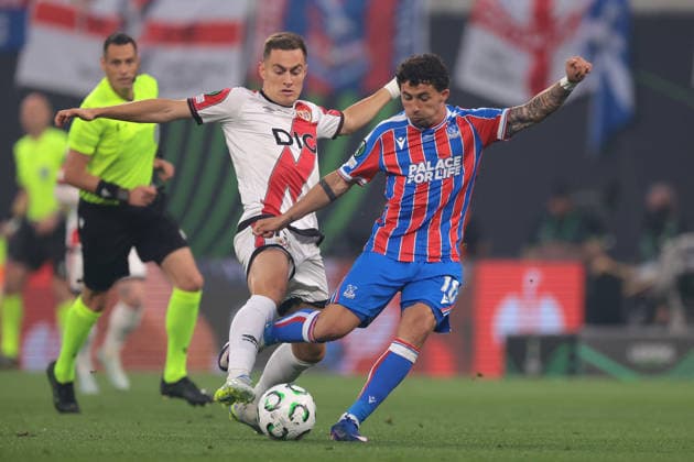 Leipzig, Germany, 27th May 2026. Yeremy Pino of Crystal Palace FC is challenged by Jorge De Frutos of Rayo Vallecano during the Crystal Palace vs Rayo Vallecano UEFA Conference League Final match at Leipzig Stadium, Leipzig. Picture credit should read: Jonathan Moscrop Sportimage EDITORIAL USE ONLY. No use with unauthorised audio, video, data, fixture lists, club league logos or live services. Online in-match use limited to 120 images, no video emulation. No use in betting, games or single club league player publications. SPI_002_JM_CPALACE_RVALLECANO_UECL SPI-4824-0002