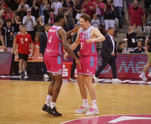 Jeff Garrett, Patrick Heckmann Telekom Baskets Bonn celebrating after victory against Fitness First Würzburg Wuerzburg Baskets Playoffs Quarterfinals Game 5 Season 2025 26