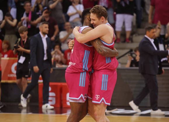 Jeff Garrett, Patrick Heckmann Telekom Baskets Bonn celebrating after victory against Fitness First Würzburg Wuerzburg Baskets Playoffs Quarterfinals Game 5 Season 2025 26