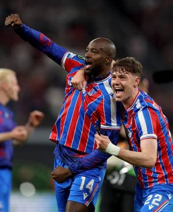 Jean-Philippe Mateta of Crystal Palace celebrates with teammate Jörgen Strand Larsen (right) winning the UEFA Conference League Crystal Palace v Rayo Vallecano, UEFA Conference League, Final, Football, Red Bull Arena, Leipzig, Germany - 27 May 2026Leipzig Red Bull Arena Germany EDITORIAL USE ONLY No use with unauthorised audio, video, data, fixture lists, club league logos or live services. Online in-match use limited to 120 images, no video emulation. No use in betting, games or single club league player publications.  Copyright: xKieranxMcManus Shutterstockx 16898266dr