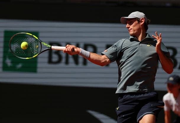 (260527) -- PARIS, May 27, 2026 -- Valentin Royer hits a return during the men s singles second round match between Novak Djokovic of Serbia and Valentin Royer of France at the French Open tennis tournament at Roland Garros, Paris, France, May 27, 2026. ) (SP)FRANCE-PARIS-TENNIS-FRENCH OPEN-MEN S SINGLES-2ND ROUND-NOVAK DJOKOVIC VS VALENTIN ROYER WuxHuiwo 