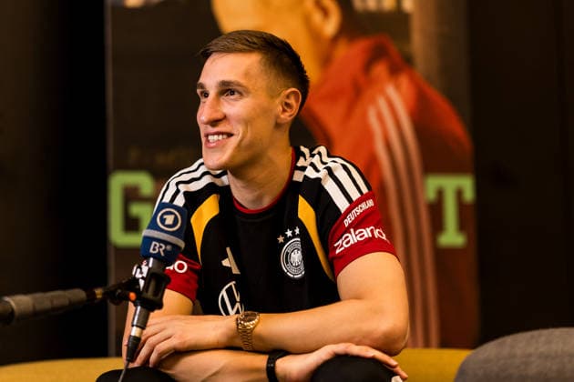 HERZOGENAURACH, GERMANY - MAY 28: Nico Schlotterbeck (Germany, 15) smiles during a media session during the training camp of Germany to prepare for the FIFA World Cup, WM, Weltmeisterschaft, Fussball 2026 on May 28, 2026 in Herzogenaurach, Germany. Bavaria Germany Copyright: xSteffiexWunderlx