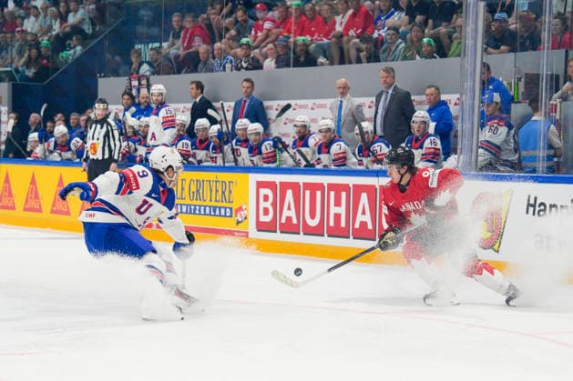 FRIBOURG, SWITZERLAND MAY 28 Porter Martone of Canada R against Ryan Leonard of United States L during the 2026 IIHF Ice Hockey World Championship Switzerland game between Canada and USA at BCF Arena on May 28, 2026 in Fribourg, Fribourg Fribourg BCF Arena Fribourg Switzerland Copyright: xJustPictures.ch JarixPestelaccix jp-en-EuSpIm-JP6_JAR_Canada_USA_28May2026_00030