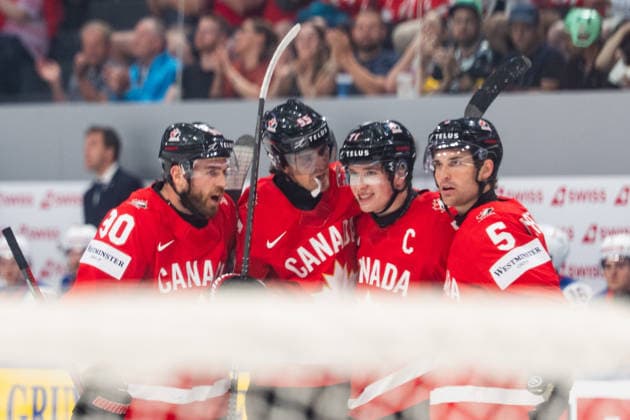 FRIBOURG, FRIBOURG - MAY 28: Canada players celebrate for the first time after Macklin Celebrini scored during the 2026 IIHF World Championship, WM, Weltmeisterschaft quarterfinal match between Canada and the United States at BCF Arena on May 28, 2026 in Fribourg, Fribourg, Switzerland.  Copyright: xLivioxBaeriswylx xSPPx Sportspressphoto_SPR156129