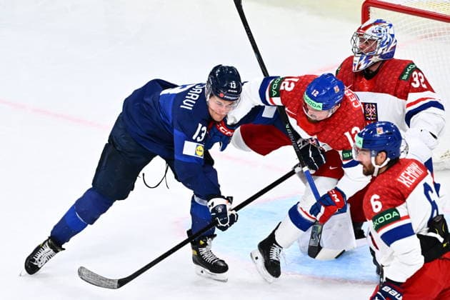 From left Jesse Puljujarvi of Finland, Jiri Cernoch of Czech Republic and goalkeeper Josef Korenar of Czech Republic in action during the quarterfinal match Finland vs Czech Republic at the 2026 IIHF Ice hockey, Eishockey World Championship, WM, Weltmeisterschaft on May 28, 2026, Zurich, Switzerland. (CTKxPhoto RadekxPetrasek) CTKPhotoP2026052806817  CTKPhotoP2026052806817