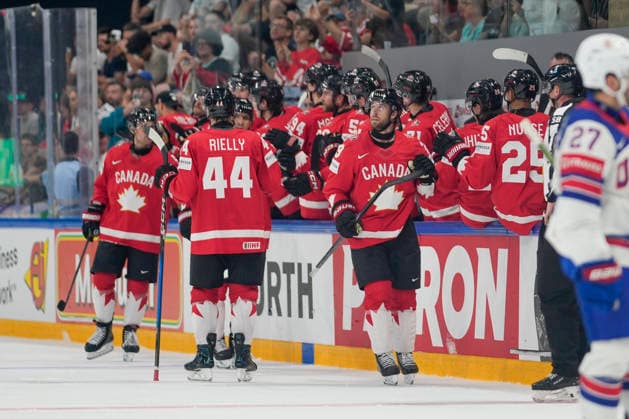 FRIBOURG, SWITZERLAND MAY 28 Parker Wotherspoon of Canada R , Morgan Rielly of Canada C celebrates second goal for Canada during the 2026 IIHF Ice Hockey World Championship Switzerland game between Canada and USA at BCF Arena on May 28, 2026 in Fribourg, Fribourg Fribourg BCF Arena Fribourg Switzerland Copyright: xJustPictures.ch JarixPestelaccix jp-en-EuSpIm-JP6_JAR_Canada_USA_28May2026_00123