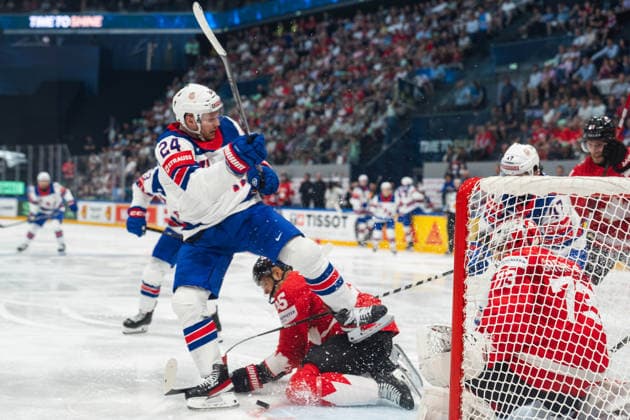 FRIBOURG, FRIBOURG - MAY 28: Mathieu Olivier of the United States battles with Darnell Nurse of Canada during the 2026 IIHF World Championship, WM, Weltmeisterschaft quarterfinal match between Canada and the United States at BCF Arena on May 28, 2026 in Fribourg, Fribourg, Switzerland.  Copyright: xLivioxBaeriswylx xSPPx Sportspressphoto_SPR156145