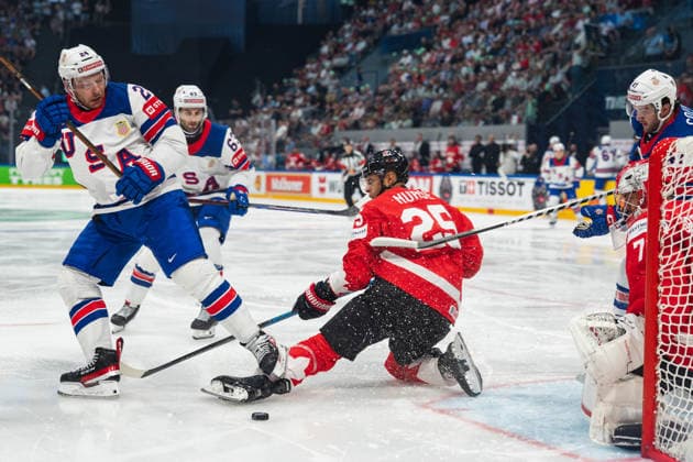 FRIBOURG, FRIBOURG - MAY 28: Mathieu Olivier of the United States battles with Darnell Nurse of Canada during the 2026 IIHF World Championship, WM, Weltmeisterschaft quarterfinal match between Canada and the United States at BCF Arena on May 28, 2026 in Fribourg, Fribourg, Switzerland.  Copyright: xLivioxBaeriswylx xSPPx Sportspressphoto_SPR156147