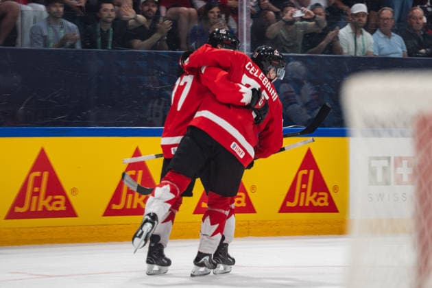 FRIBOURG, FRIBOURG - MAY 28: Sidney Crosby and Macklin Celebrini of Canada celebrate a goal during the 2026 IIHF World Championship, WM, Weltmeisterschaft quarterfinal match between Canada and the United States at BCF Arena on May 28, 2026 in Fribourg, Fribourg, Switzerland.  Copyright: xLivioxBaeriswylx xSPPx Sportspressphoto_SPR156193