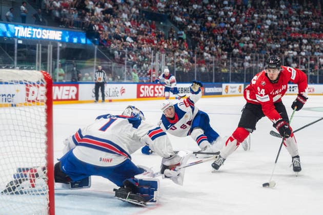 FRIBOURG, FRIBOURG - MAY 28: Porter Martone of Canada attempts a shot during the 2026 IIHF World Championship, WM, Weltmeisterschaft quarterfinal match between Canada and the United States at BCF Arena on May 28, 2026 in Fribourg, Fribourg, Switzerland.  Copyright: xLivioxBaeriswylx xSPPx Sportspressphoto_SPR156196