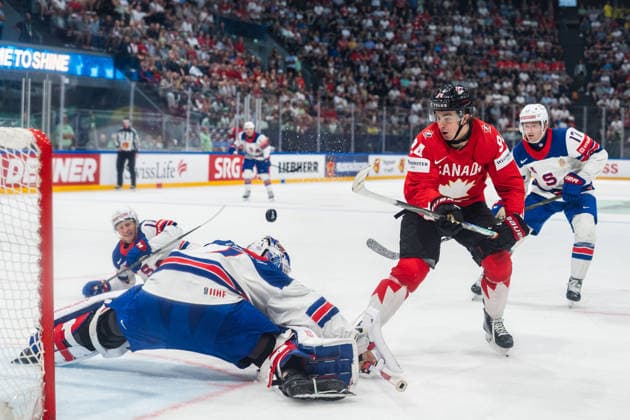 FRIBOURG, FRIBOURG - MAY 28: Porter Martone of Canada attempts a shot during the 2026 IIHF World Championship, WM, Weltmeisterschaft quarterfinal match between Canada and the United States at BCF Arena on May 28, 2026 in Fribourg, Fribourg, Switzerland.  Copyright: xLivioxBaeriswylx xSPPx Sportspressphoto_SPR156197