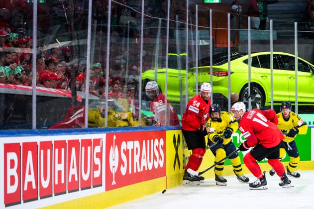 260528 Christian Marti and Dean Kukan of Switzerland compete for the puck with Viggo Björck of Sweden during the 2026 IIHF Ice Hockey World Championship quarterfinal match between Switzerland and Sweden on May 28, 2026 in Zürich Photo Jesper Zerman BILDBYRAN kod JZ JZ0733 ishockey ice hockey ishockey vm 2026 vm 2026 iihf world championship kvartsfinal quarterfinal quarterfinals switzerland schweiz sverige sweden bbeng  Copyright: JESPERxZERMAN BB260528JZ096