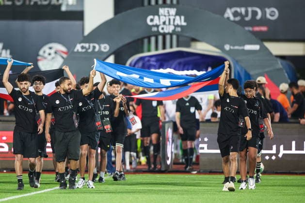 EGYPT, CAIRO - MAY 28, 2026: People carry flags ahead of a friendly football match between Egypt and Russia at the Cairo International Stadium. Peter Kovalev TASS  93143959