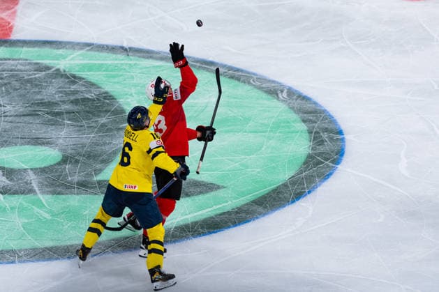 ZURICH, SWITZERLAND - MAY 28: Nico Hischier (Switzerland, 13) catching the puck before Anton Frondell (Sweden, 16) during the Quarter Finals - Match 59 between Switzerland and Sweden at the IIHF Ice hockey, Eishockey World Championship, WM, Weltmeisterschaft 2026, Swiss Life Arena on May 28, 2026 in Zurich, Switzerland. Zurich Switzerland Copyright: xTimoxSteinx