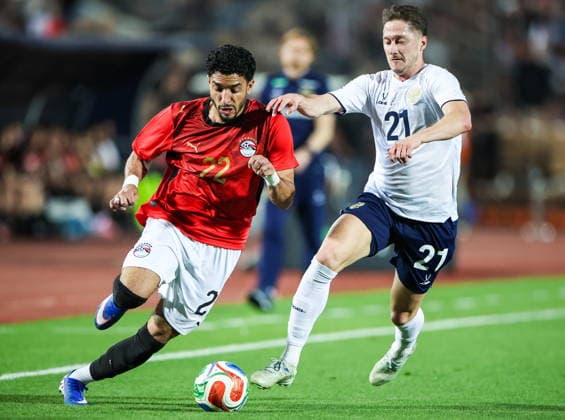 EGYPT, CAIRO - MAY 28, 2026: Egypt s Omar Marmoush (L) and Russia s Anton Miranchuk fight for the ball in a friendly football match between Egypt and Russia at the Cairo International Stadium. Peter Kovalev TASS  93144630