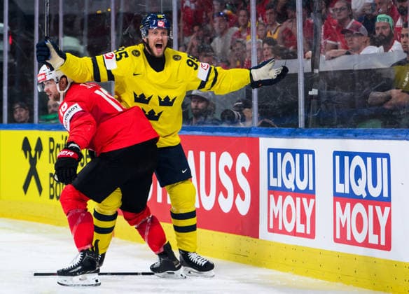 260528 Jacob De La Rose of Sweden reacts in a duel with Sven Jung of Switzerland during the 2026 IIHF Ice Hockey World Championship quarterfinal match between Switzerland and Sweden on May 28, 2026 in Zurich Photo Jesper Zerman BILDBYRAN kod JZ JZ0733 ishockey ice hockey ishockey vm 2026 vm 2026 iihf world championship kvartsfinal quarterfinal quarterfinals switzerland schweiz sverige sweden bbeng  Copyright: JESPERxZERMAN BB260528JZ127