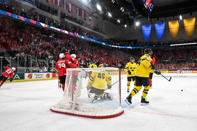 ZURICH, SWITZERLAND MAY 28 Calvin Thurkauf of Switzerland L celebrate after scoring a goal against goalkeeper Magnus Hellberg of Sweden during the 2026 IIHF Ice Hockey World Championship Switzerland game between Switzerland and Sweden at Swiss Life Arena on May 28, 2026 in Zurich, Zurich Zurich Swiss Life Arena Zurich Switzerland Copyright: xJustPictures.ch AndreaxBrancax jp-en-EuSpIm-JP7_ANB_FinCze_28052026_6015