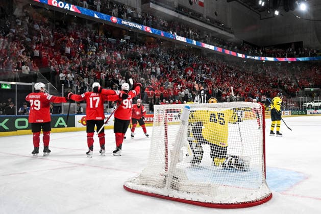 ZURICH, SWITZERLAND MAY 28 Calvin Thurkauf of Switzerland L celebrate with Ken Jager of Switzerland C and Roman Josi of Switzerland R after scoring a goal against goalkeeper Magnus Hellberg of Sweden during the 2026 IIHF Ice Hockey World Championship Switzerland game between Switzerland and Sweden at Swiss Life Arena on May 28, 2026 in Zurich, Zurich Zurich Swiss Life Arena Zurich Switzerland Copyright: xJustPictures.ch AndreaxBrancax jp-en-EuSpIm-JP7_ANB_FinCze_28052026_6038