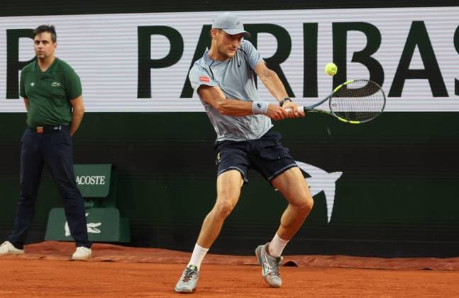 Belgian Raphael Collignon celebrates during a tennis match against US Shelton, in the second round of the men s singles at the Roland Garros French Open tennis tournament, in Paris, France, Thursday 28 May 2026. This year s tournament takes place from 18 May to 07 June. VIRGINIExLEFOUR  x175329557x