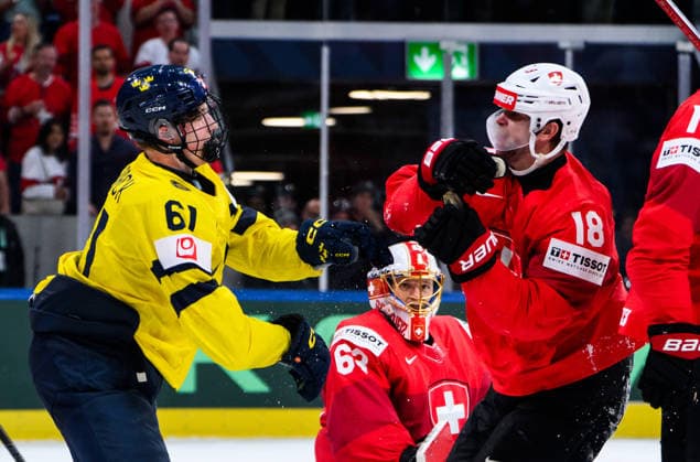 260528 Viggo Björck of Sweden and Sven Jung of Switzerland during the 2026 IIHF Ice Hockey World Championship quarterfinal match between Switzerland and Sweden on May 28, 2026 in Zürich Photo Jesper Zerman BILDBYRAN kod JZ JZ0733 ishockey ice hockey ishockey vm 2026 vm 2026 iihf world championship kvartsfinal quarterfinal quarterfinals switzerland schweiz sverige sweden bbeng  Copyright: JESPERxZERMAN BB260528JZ165