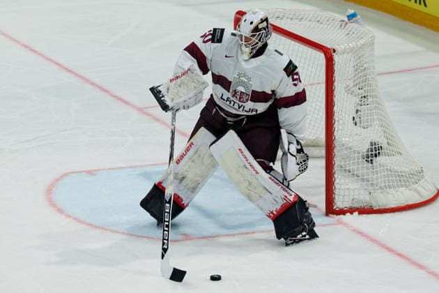 Fribourg, Switzerland - May 28 : Kristers Gudlevskis of Latvia controls the puck (action) during the 2026 IIHF Ice hockey, Eishockey World Championship, WM, Weltmeisterschaft Switzerland Quarter Final match between Norway and Latvia at BCF Arena on May 28 , 2026 in Fribourg, Switzerland.  Copyright: xGiuseppexVelletrix Sportspressphoto_SPR156415