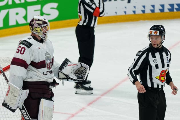 Fribourg, Switzerland - May 28 : Kristers Gudlevskis of Latvia wants to give the puck to the referee during the 2026 IIHF Ice hockey, Eishockey World Championship, WM, Weltmeisterschaft Switzerland Quarter Final match between Norway and Latvia at BCF Arena on May 28 , 2026 in Fribourg, Switzerland.  Copyright: xGiuseppexVelletrix Sportspressphoto_SPR156418