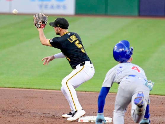 Pittsburgh Pirates second baseman Brandon Lowe (5) catches the throw from the third basemen and tags out Chicago Cubs center fielder Pete Crow-Armstrong (4) in the third inning against the Chicago Cubs at PNC Park on Thursday, May 28, 2026 in Pittsburgh.  PIT2026052808 ArchiexCarpenter