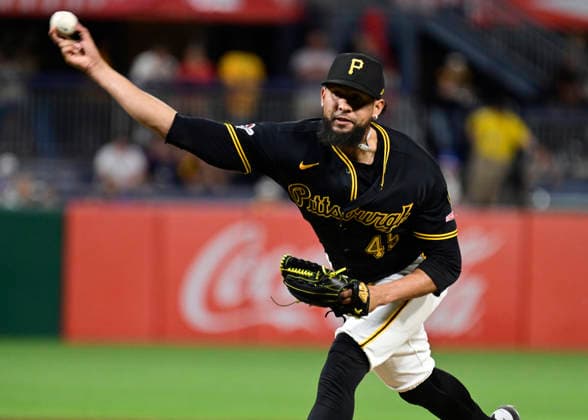 Pittsburgh Pirates pitcher Yohan Ramirez (49) throws in the ninth inning of the Chicago Cubs 7-2 win at PNC Park on Thursday, May 28, 2026 in Pittsburgh.  PIT2026052825 ArchiexCarpenter