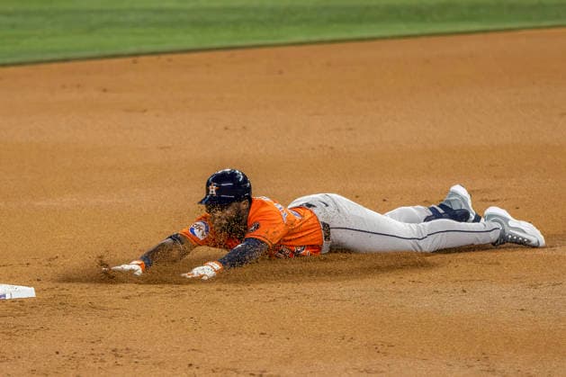 May 28, 2026, Arlington, Texas, USA: Houston Astros center fielder TAYLOR TRAMMELL (26) slides into second for a double during a MLB, Baseball Herren, USA game between the Houston Astros and Texas Rangers at Globe Life Field. Houston wins 5-1. Arlington USA - ZUMAf180 20260528_zsp_f180_021 Copyright: xMarkxFannx