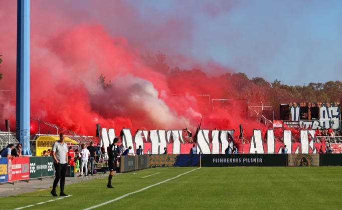 Leipzig, 28 05 2026, Bruno Plache Stadion,Soccer, HIN Promotion match to 3 Liga , 1 FC LOK LEIPZIG vs FWK WÜRZBURGER KICKERS , In the picture fans of Würzburg with pyro choreo MACHT SIE ALLE , Picture Point