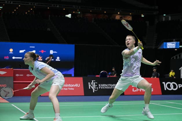 (260529) -- SINGAPORE, May 29, 2026 -- Thom Gicquel (R) Delphine Delrue compete during the mixed doubles round of 16 match between Gao Jiaxuan Wei Yaxin of China and Thom Gicquel Delphine Delrue of France at the Singapore Badminton Open 2026 in Singapore, May 28, 2026. (Photo by Xinhua) (SP)SINGAPORE-BADMINTON-SINGAPORE OPEN-MIXED DOUBLES ThenxChihxWey 
