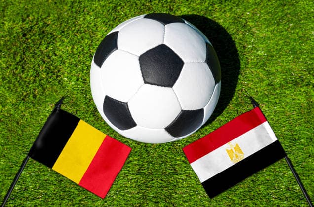 May 22, 2026: PHOTO MONTAGE, 2026 FIFA World Cup, WM, Weltmeisterschaft, Fussball National flags of Belgium and Egypt with a soccer ball on the field. Stock image for the group stage match on June 15 at the 2026 FIFA World Cup *** FOTOMONTAGE, Fußball-Weltmeisterschaft 2026: Nationalflaggen von Belgien und Ägypten mit Fußball auf Rasen. Symbolbild zum WM-Gruppenspiel am 15 Juni bei der FIFA Fussball-Weltmeisterschaft 2026