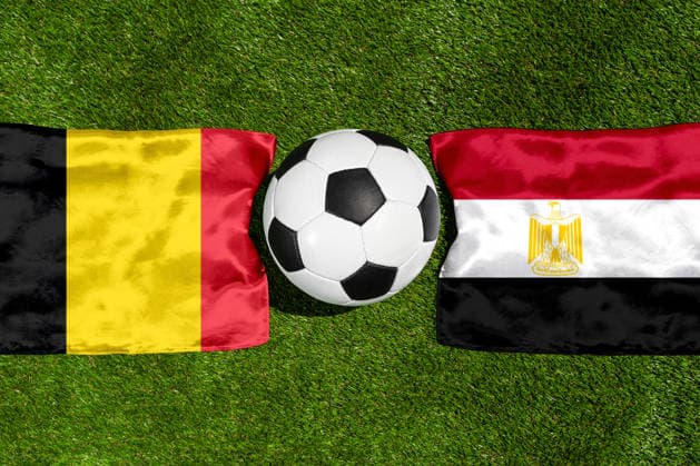 May 22, 2026: PHOTO MONTAGE, 2026 FIFA World Cup, WM, Weltmeisterschaft, Fussball National flags of Belgium and Egypt with a soccer ball on the field. Stock image for the group stage match on June 15 at the 2026 FIFA World Cup *** FOTOMONTAGE, Fußball-Weltmeisterschaft 2026: Nationalflaggen von Belgien und Ägypten mit Fußball auf Rasen. Symbolbild zum WM-Gruppenspiel am 15 Juni bei der FIFA Fussball-Weltmeisterschaft 2026