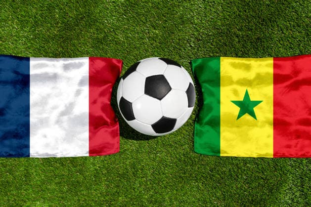 May 22, 2026: PHOTO MONTAGE, 2026 FIFA World Cup, WM, Weltmeisterschaft, Fussball National flags of France and Senegal with a soccer ball on the field. Stock image for the group stage match on June 16 at the 2026 FIFA World Cup *** FOTOMONTAGE, Fußball-Weltmeisterschaft 2026: Nationalflaggen von Frankreich und Senegal mit Fußball auf Rasen. Symbolbild zum WM-Gruppenspiel am 16 Juni bei der FIFA Fussball-Weltmeisterschaft 2026