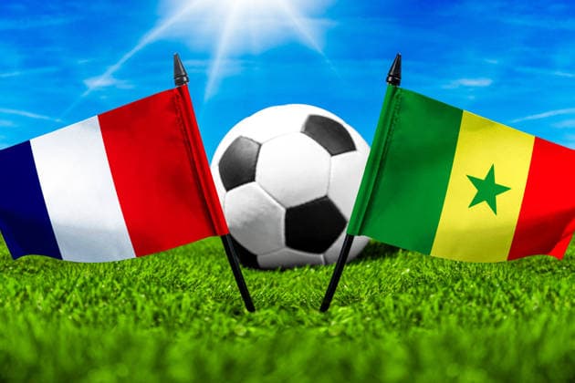 May 22, 2026: PHOTO MONTAGE, 2026 FIFA World Cup, WM, Weltmeisterschaft, Fussball National flags of France and Senegal with a soccer ball on the field. Stock image for the group stage match on June 16 at the 2026 FIFA World Cup *** FOTOMONTAGE, Fußball-Weltmeisterschaft 2026: Nationalflaggen von Frankreich und Senegal mit Fußball auf Rasen. Symbolbild zum WM-Gruppenspiel am 16 Juni bei der FIFA Fussball-Weltmeisterschaft 2026