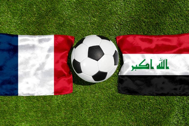 May 22, 2026: PHOTO MONTAGE, 2026 FIFA World Cup, WM, Weltmeisterschaft, Fussball National flags of France and Iraq with a soccer ball on the field. Stock image for the group stage match on June 22 at the 2026 FIFA World Cup *** FOTOMONTAGE, Fußball-Weltmeisterschaft 2026: Nationalflaggen von Frankreich und Irak mit Fußball auf Rasen. Symbolbild zum WM-Gruppenspiel am 22 Juni bei der FIFA Fussball-Weltmeisterschaft 2026