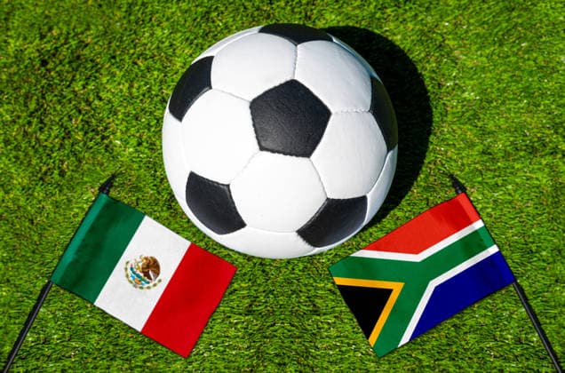 May 22, 2026: PHOTO MONTAGE, 2026 FIFA World Cup, WM, Weltmeisterschaft, Fussball National flags of Mexico and South Africa with a soccer ball on a field. Stock image for the group stage match on June 11 at the 2026 FIFA World Cup *** FOTOMONTAGE, Fußball-Weltmeisterschaft 2026: Nationalflaggen von Mexiko und Südafrika mit Fußball auf Rasen. Symbolbild zum WM-Gruppenspiel am 11 Juni bei der FIFA Fussball-Weltmeisterschaft 2026