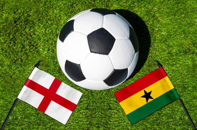 May 22, 2026: PHOTO MONTAGE, 2026 FIFA World Cup, WM, Weltmeisterschaft, Fussball National flags of England and Ghana with a soccer ball on the field. Stock image for the group stage match on June 23 at the 2026 FIFA World Cup *** FOTOMONTAGE, Fußball-Weltmeisterschaft 2026: Nationalflaggen von England und Ghana mit Fußball auf Rasen. Symbolbild zum WM-Gruppenspiel am 23 Juni bei der FIFA Fussball-Weltmeisterschaft 2026
