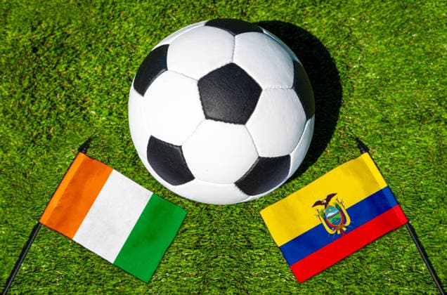 May 22, 2026: PHOTO MONTAGE, 2026 FIFA World Cup, WM, Weltmeisterschaft, Fussball National flags of Ivory Coast and Ecuador with a soccer ball on the field. Stock image for the group stage match on June 15 at the 2026 FIFA World Cup *** FOTOMONTAGE, Fußball-Weltmeisterschaft 2026: Nationalflaggen von Elfenbeinküste und Equador mit Fußball auf Rasen. Symbolbild zum WM-Gruppenspiel am 15 Juni bei der FIFA Fussball-Weltmeisterschaft 2026