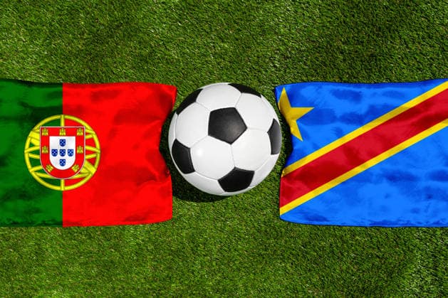 May 22, 2026: PHOTO MONTAGE, 2026 FIFA World Cup, WM, Weltmeisterschaft, Fussball National flags of Portugal and Congo with a soccer ball on the field. Stock image for the group stage match on June 17 at the 2026 FIFA World Cup *** FOTOMONTAGE, Fußball-Weltmeisterschaft 2026: Nationalflaggen von Portugal und Kongo mit Fußball auf Rasen. Symbolbild zum WM-Gruppenspiel am 17 Juni bei der FIFA Fussball-Weltmeisterschaft 2026