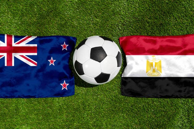 May 22, 2026: PHOTO MONTAGE, 2026 FIFA World Cup, WM, Weltmeisterschaft, Fussball National flags of New Zealand and Egypt with a soccer ball on a field. Stock image for the group stage match on June 22 at the 2026 FIFA World Cup *** FOTOMONTAGE, Fußball-Weltmeisterschaft 2026: Nationalflaggen von Neuseeland und Ägypten mit Fußball auf Rasen. Symbolbild zum WM-Gruppenspiel am 22 Juni bei der FIFA Fussball-Weltmeisterschaft 2026